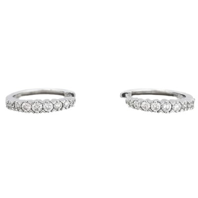 Lot 338 - A pair of contemporary platinum certified diamond set hoop earrings by Rhapsody.