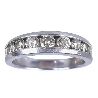 Lot 342 - A platinum diamond set half eternity ring.