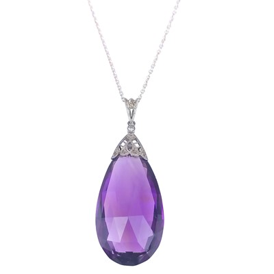 Lot 345 - An early 20th century platinum amethyst and diamond set pendant.