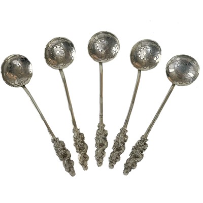 Lot 459 - A Japanese white metal set of five Nagasaki teaspoons with dragon handles.