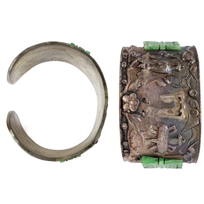 Lot 462 - A Chinese silver and jade cuff bangle.