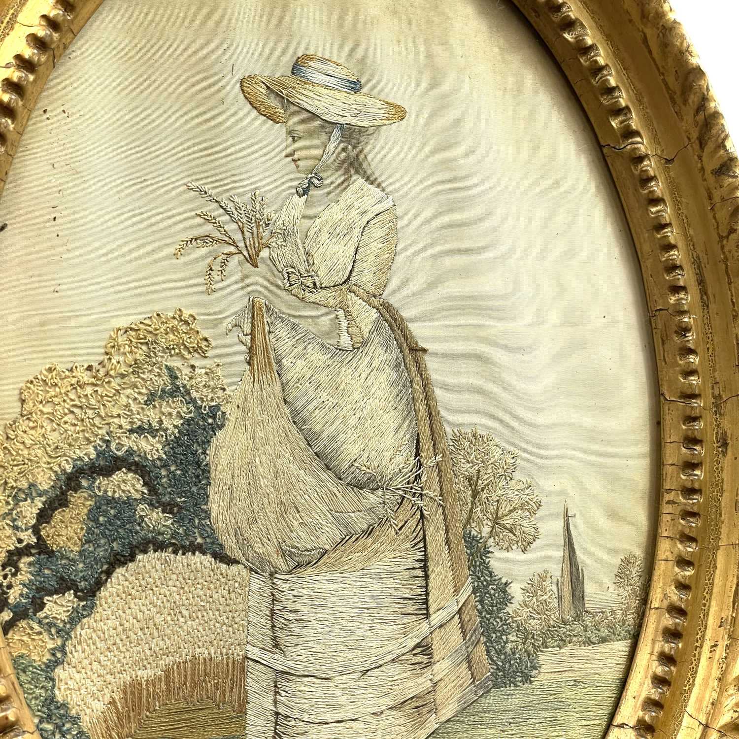 Lot 181 - A Regency oval silk work picture.