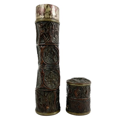 Lot 72 - A Tibetan copper scroll holder, circa 1900.