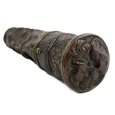 Lot 72 - A Tibetan copper scroll holder, circa 1900.