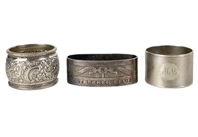 Lot 35 - Three heavy silver napkin rings.