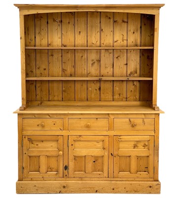 Lot 675 - A 20th century pine dresser.