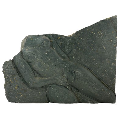 Lot 79 - A female nude sculpted on slate