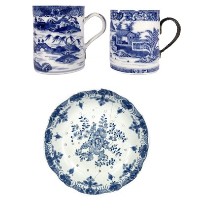 Lot 56 - Two Chinese export blue and white porcelain tankards, Qianlong period.