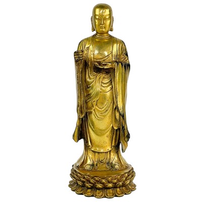 Lot 1205 - A Chinese gilt bronze model of buddha, 19th century.