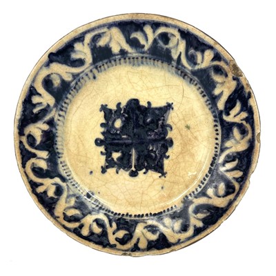 Lot 283 - A Persian blue and white pottery plate, 17th century.