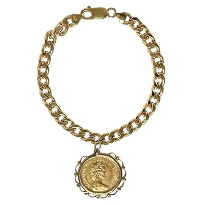 Lot 355 - A 1982 half sovereign coin 9ct mounted pendant on 9ct curb link bracelet.