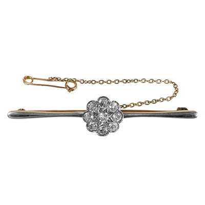 Lot 22 - An early 20th century gold and platinum diamond cluster bar brooch.