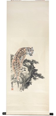 Lot 479 - A Chinese painted scroll depicting a tiger in a landscape, 20th century.