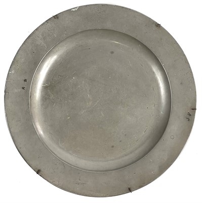 Lot 168 - A George III pewter charger.