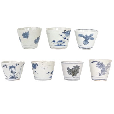 Lot 485 - Seven Japanese blue and white porcelain soba-choku cups, 18th/19th century.