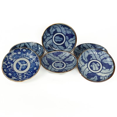 Lot 489 - A pair of Japanese fan-shaped dishes, late 19th century.