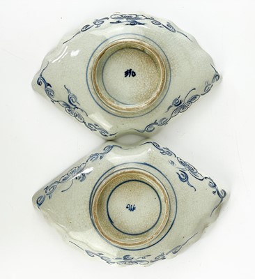 Lot 489 - A pair of Japanese fan-shaped dishes, late 19th century.