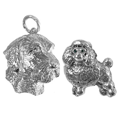 Lot 375 - A .999 fine silver Poodle ring and a .999 terrier dog pendant by James Suddaby.