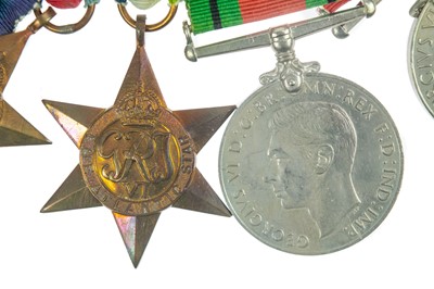 Lot 247 - DSO group of Eight Medals RN