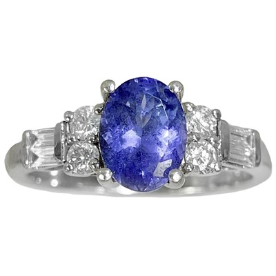 Lot 376 - A platinum, certified 1.25ct AAA Tanzanite and diamond set ring.