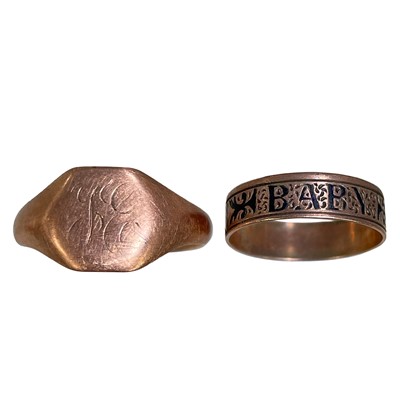 Lot 379 - A Victorian rose gold and black enamel babies ring inscribed 'BABY'.