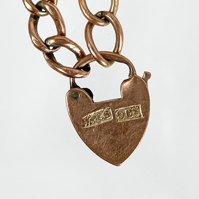 Lot 379 - A Victorian rose gold and black enamel babies ring inscribed 'BABY'.