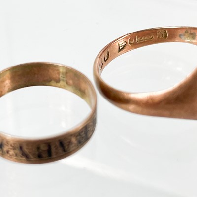 Lot 379 - A Victorian rose gold and black enamel babies ring inscribed 'BABY'.