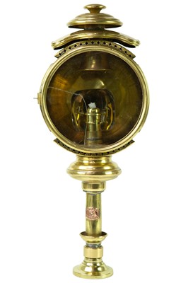 Lot 78 - A brass nautical candle lamp