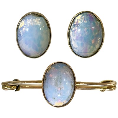 Lot 381 - A 15ct gold synthetic opal set pin brooch and pair of matching stud earrings.