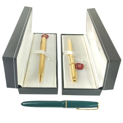 Lot 549 - Two Parker Sonnet 23k gold plated pencils.