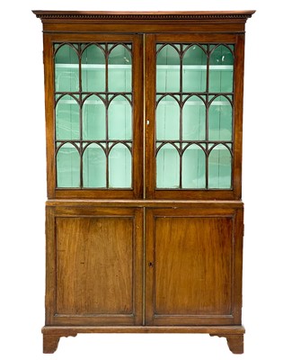 Lot 409 - A 19th century mahogany bookcase cabinet.