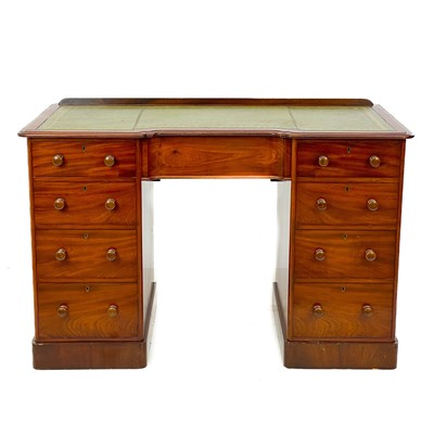 Lot 639 - A Victorian mahogany fixed pedestal desk.