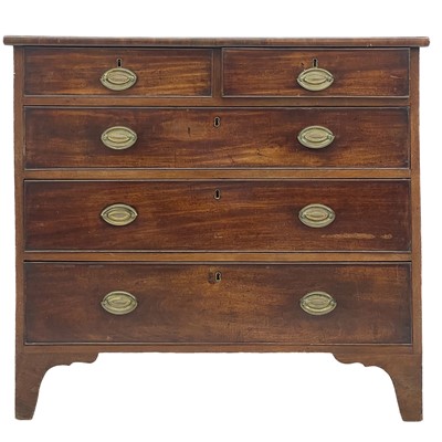 Lot 664 - A George III mahogany chest of two short and three long drawers.