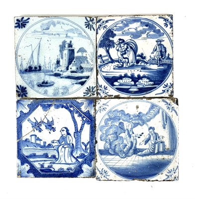 Lot 133 - A group of four Delft blue and white tiles.