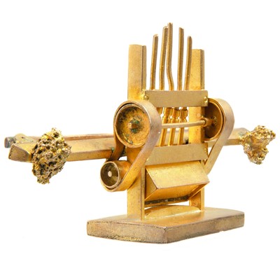 Lot 396 - An unusual 19th century gold prospectors brooch in the form of a stamp mill machine.