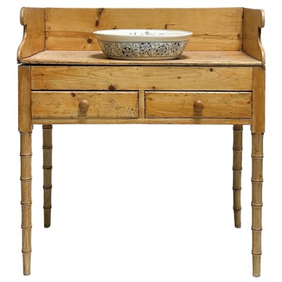 Lot 132 - A 19th century pine washstand.