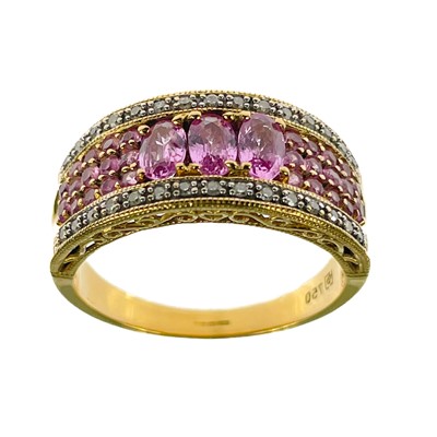 Lot 401 - An 18ct diamond and pink sapphire set dress ring by QVC.