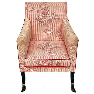 Lot 707 - An early 20th century ebonised frame upholstered armchair.