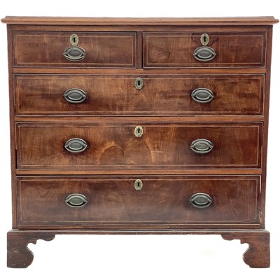 Lot 710 - A George III mahogany chest.