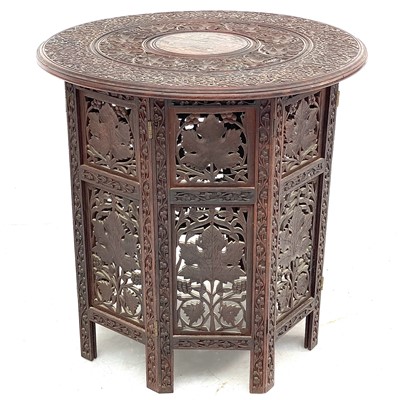 Lot 717 - An Anglo-Indian brass inlaid teak occasional table.