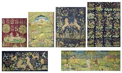 Lot 343 - A 20th century needlepoint of a Lion and Unicorn in a garden landscape.