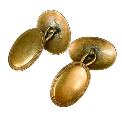 Lot 411 - A Victorian pair of 9ct rose gold oval cuff links.