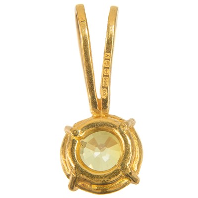 Lot 420 - A 24ct yellow sapphire set pendant by James Suddaby.
