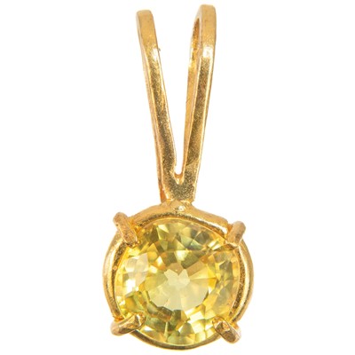 Lot 420 - A 24ct yellow sapphire set pendant by James Suddaby.