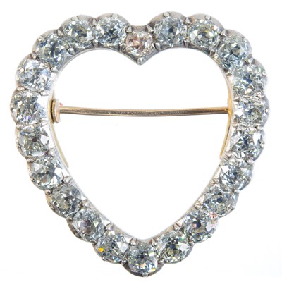 Lot 155 - An astonishing 19th century diamond set silver open heart brooch.