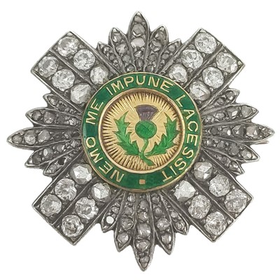 Lot 448 - A 19th century gold diamond and enamel Star of the Order of the Thistle brooch.