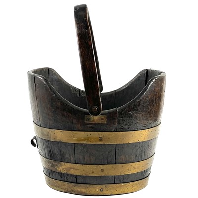 Lot 263 - A brass bound oak coal bucket.