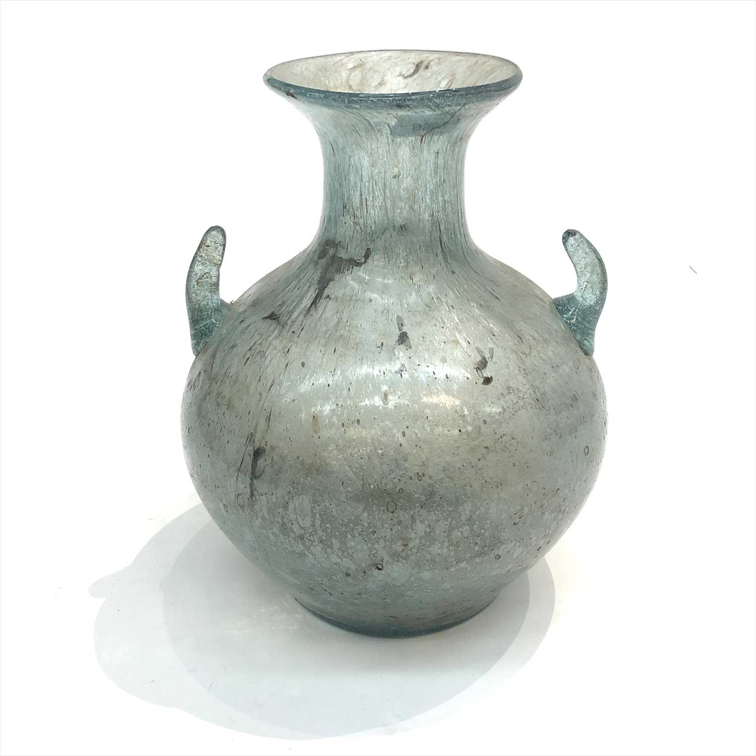 Lot 1486 - A Roman style glass vase with twin handles.