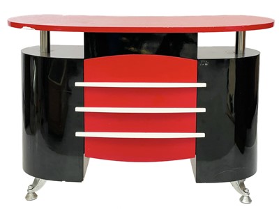 Lot 2 - A Dir Janus black and red laminated Barbers or shop cabinet.