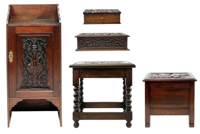 Lot 244 - A collection of five oak carved Arts and Crafts items.